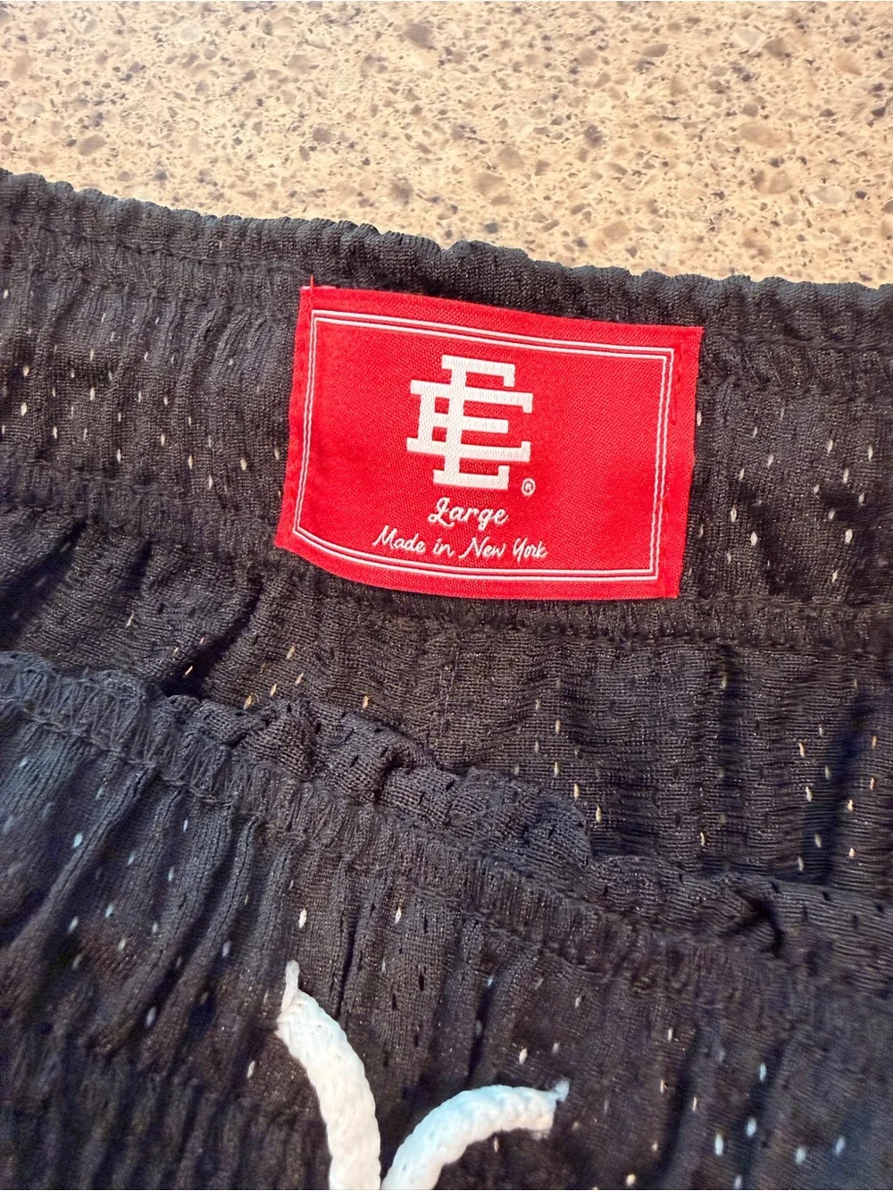 NWT - Eric Emanuel Black Mesh Athletic Shorts with White Logo.  With sticker